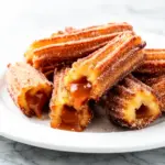 gooey cinnamon sugar churro bites - featured image