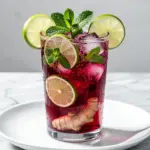 sparkling hibiscus ginger mocktail - featured image